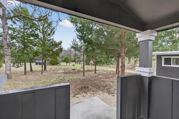 a backyard of a house with seating space