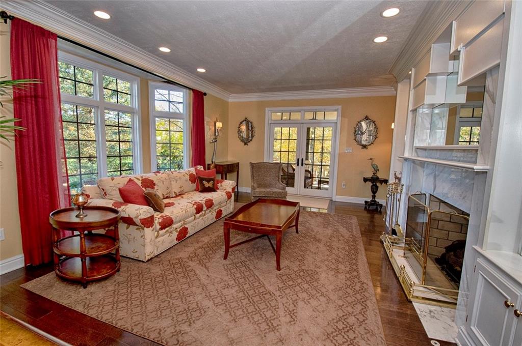 105 Lantern Circle McMurray, PA 15317 - Photo 3 of 25 a living room with furniture and a fireplace