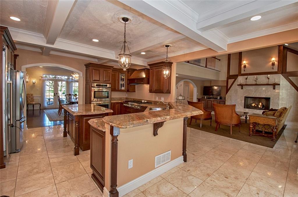 105 Lantern Circle McMurray, PA 15317 - Photo 5 of 25 a view of a kitchen with furniture and a chandelier
