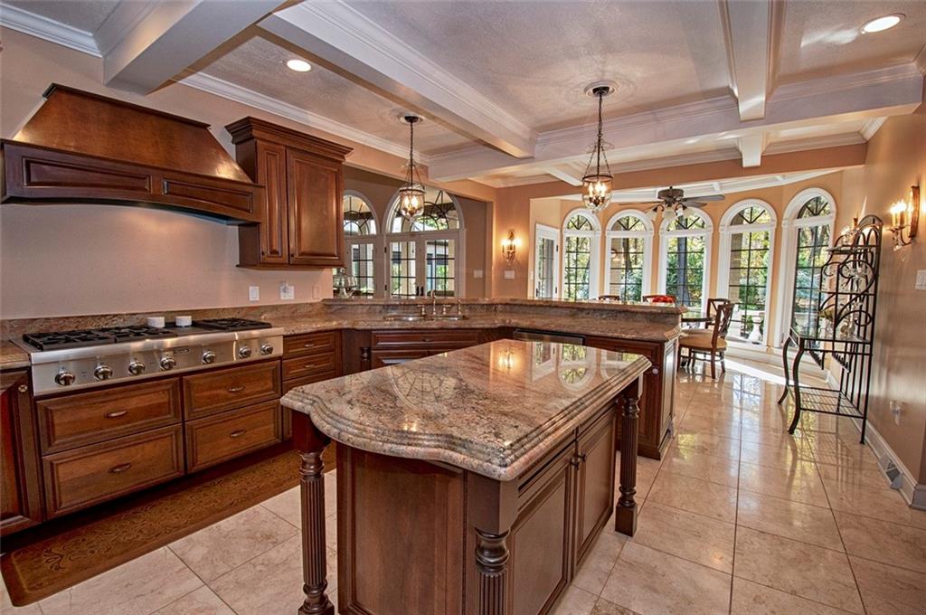 105 Lantern Circle McMurray, PA 15317 - Photo 6 of 25 a kitchen with stainless steel appliances granite countertop a stove a sink and a refrigerator