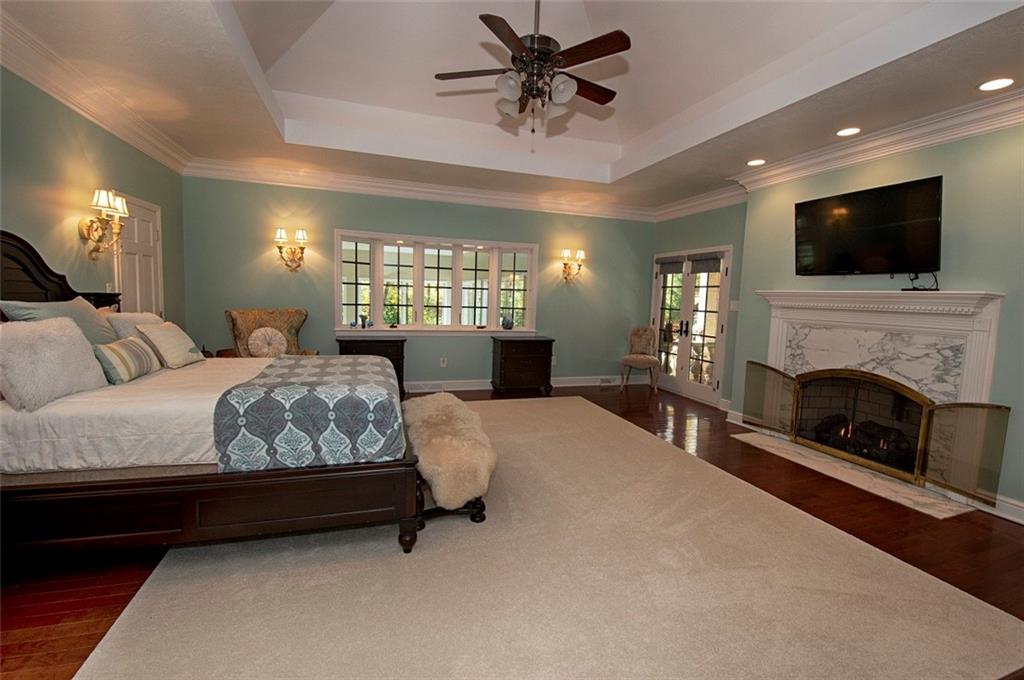 105 Lantern Circle McMurray, PA 15317 - Photo 10 of 25 a spacious bedroom with a bed and a flat screen tv