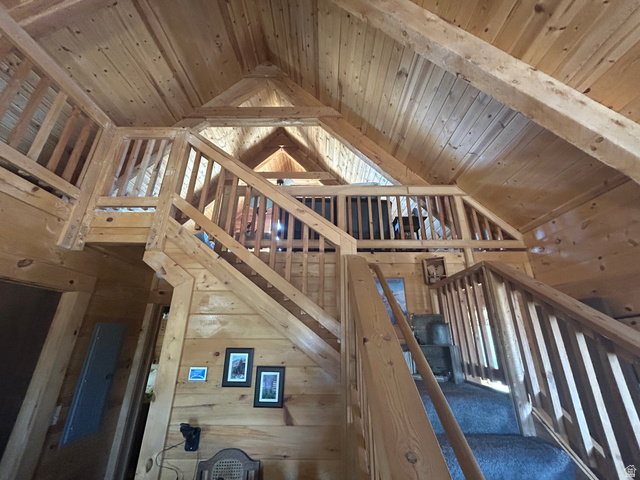 19075 West Honesty Cove Duchesne, UT 84021 - Photo 25 of 44 Open-concept interior featuring extensive wood paneling and a multi-level design