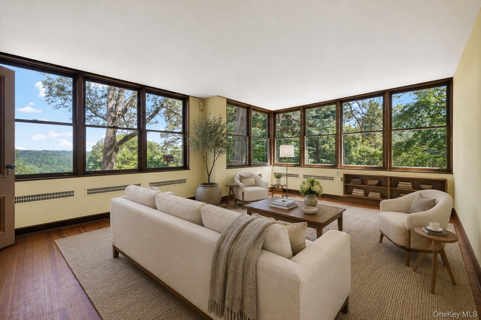 433 Arcady Road Ossining, NY 10562 - Photo 11 of 21 a living room with furniture and a large window