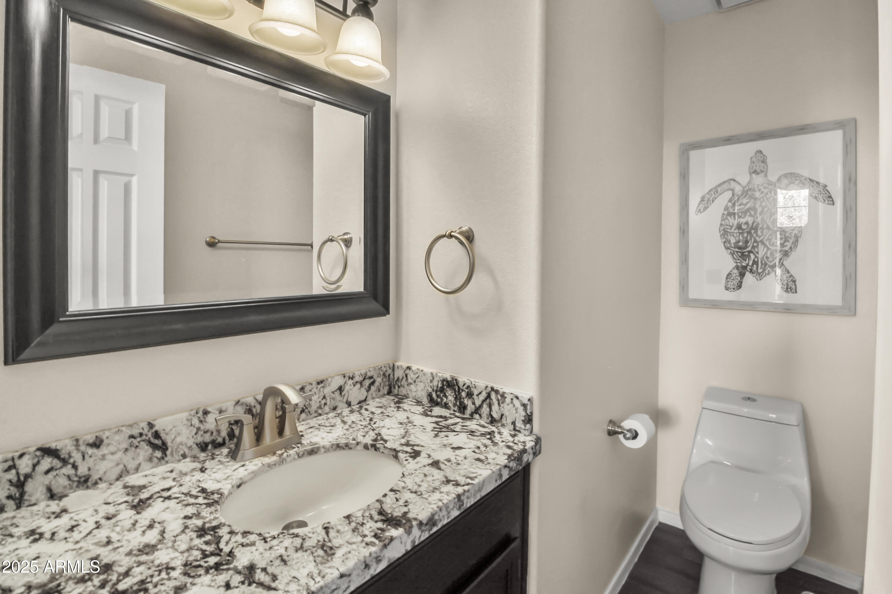 1122 West Sandy Banks Gilbert, AZ 85233 - Photo 11 of 22 a bathroom with a granite countertop sink and a mirror