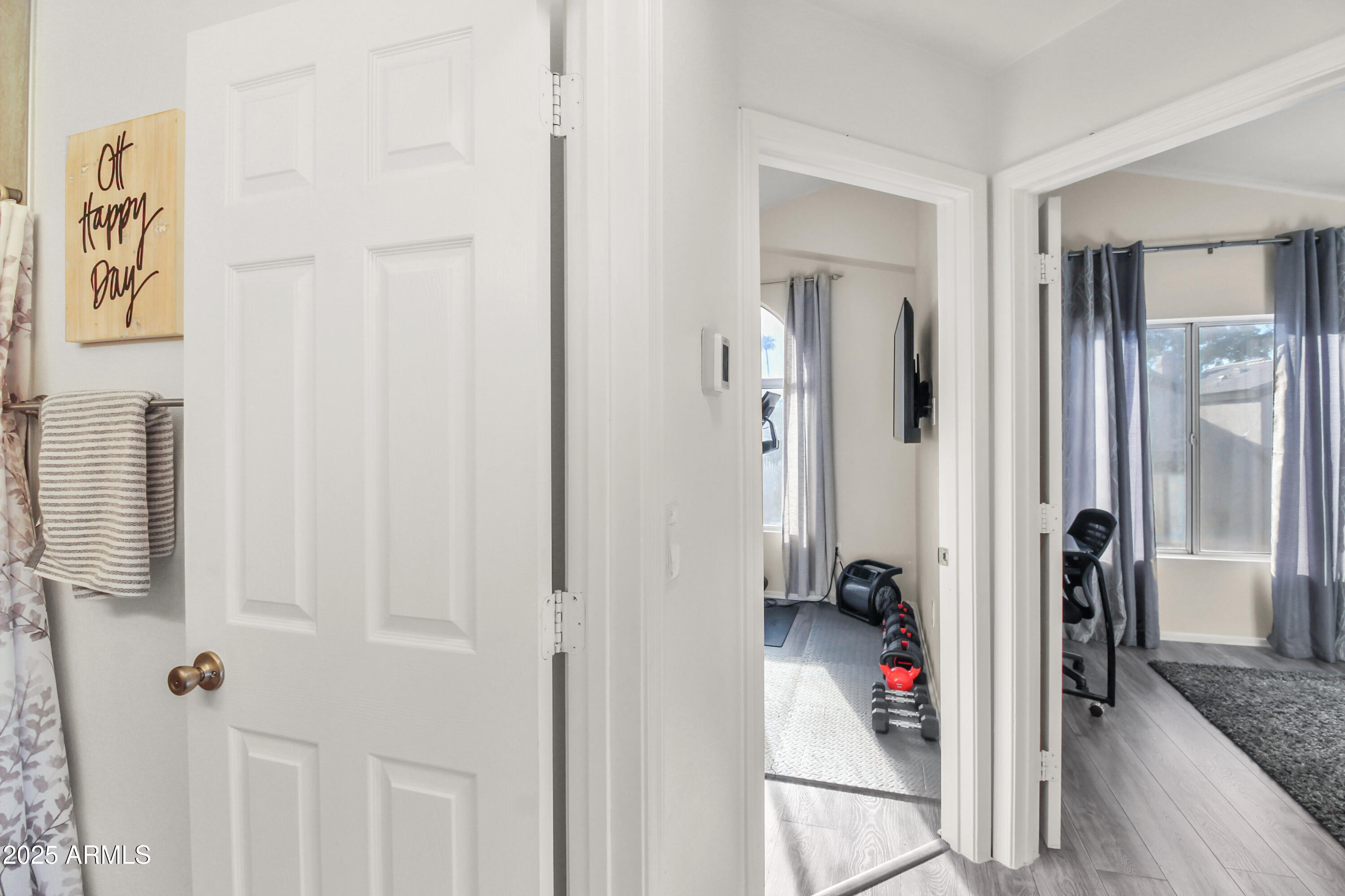 1122 West Sandy Banks Gilbert, AZ 85233 - Photo 17 of 22 a view of a hallway with wooden floor and closet