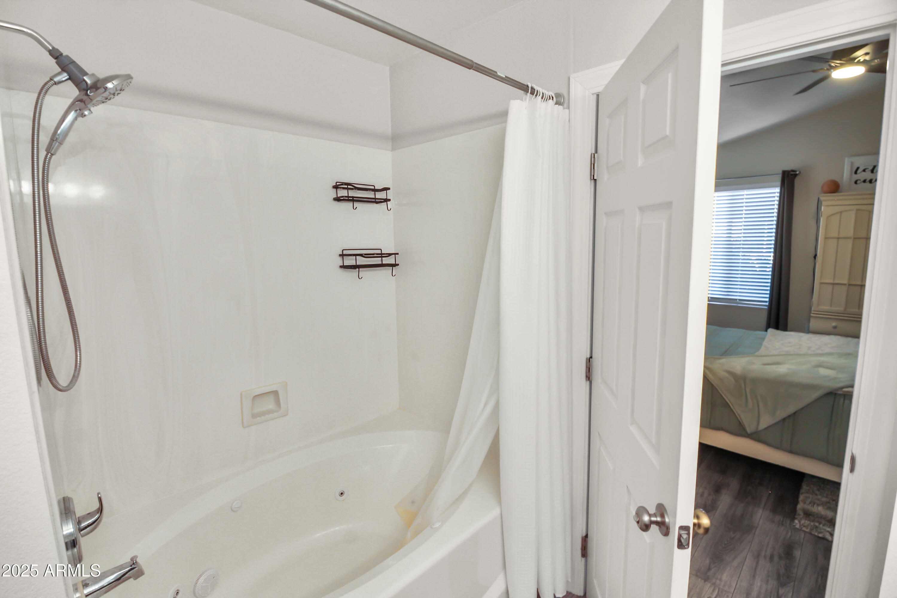 1122 West Sandy Banks Gilbert, AZ 85233 - Photo 18 of 22 a en suite bathroom with a shower and a tub