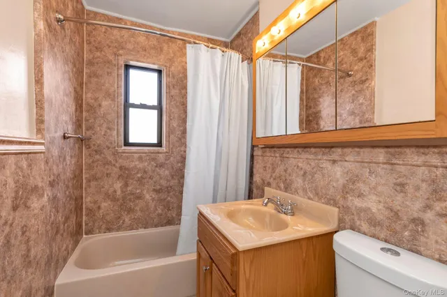 a bathroom with a sink and a bathtub