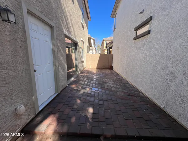 a view of a pathway along the building