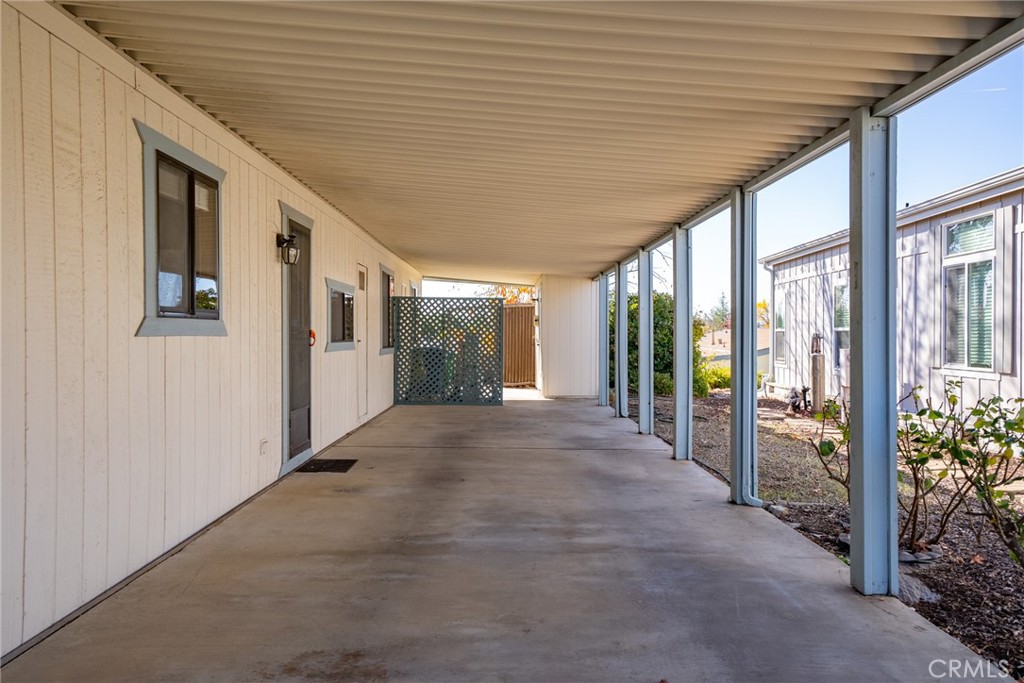 334 Bobwhite Drive Paso Robles, CA 93446 - Photo 21 of 23 a view of a porch with furniture and floor to ceiling window