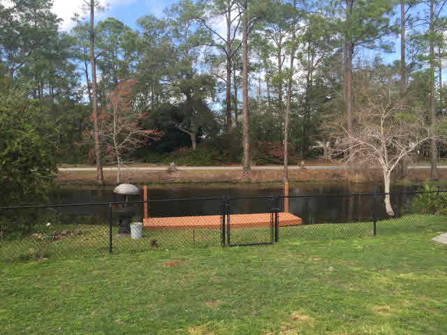 13 Claudette Circle Orange Beach, AL 36561 - Photo 16 of 22 Fenced backyard