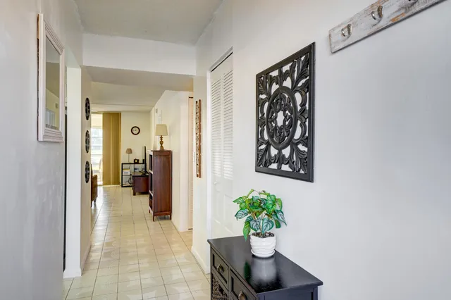 a hallway with flowers and flowers