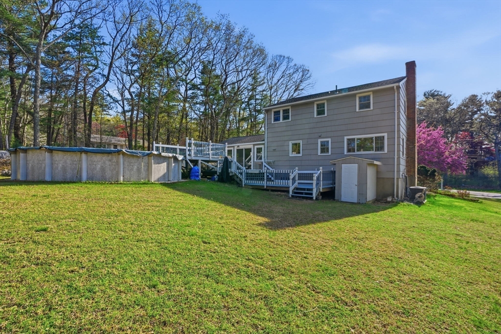 3 Fairway Drive Canton, MA 02021 - Photo 25 of 34 a view of house with backyard and swimming pool