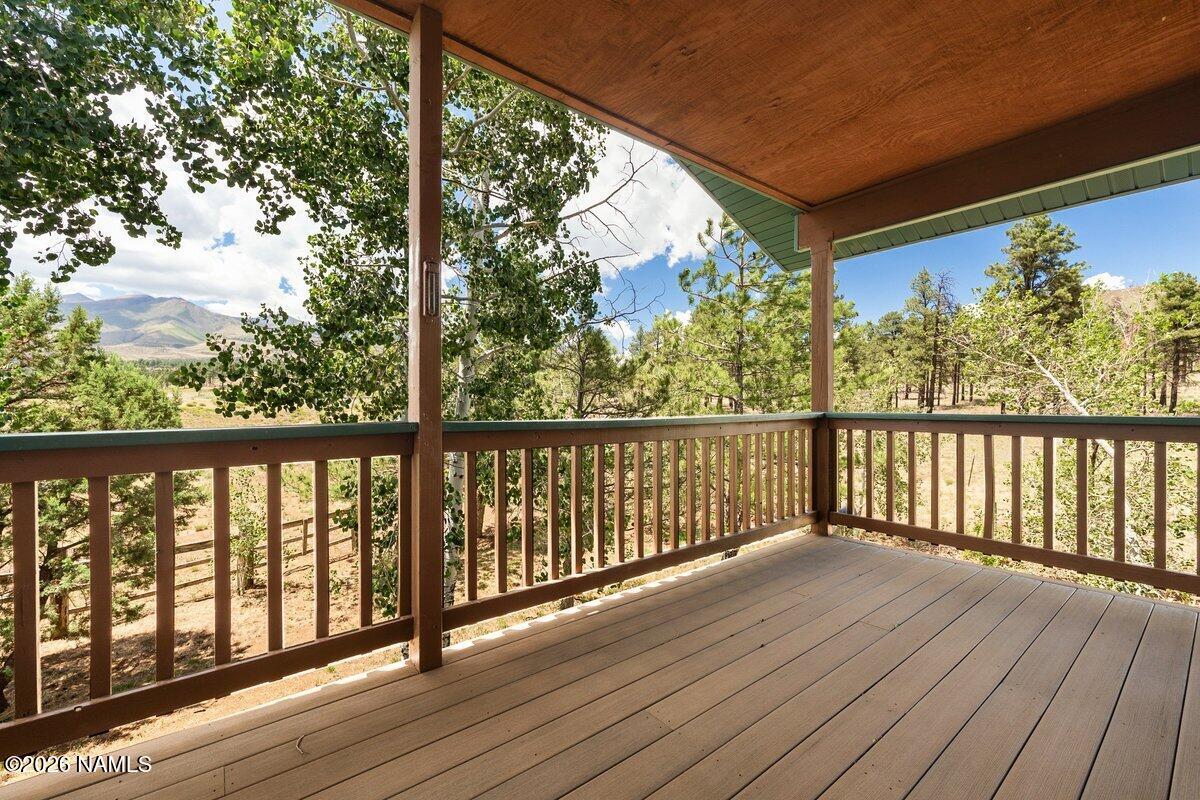 5535 East Western Star Road Flagstaff, AZ 86004 - Photo 48 of 49 a view of balcony with wooden floor
