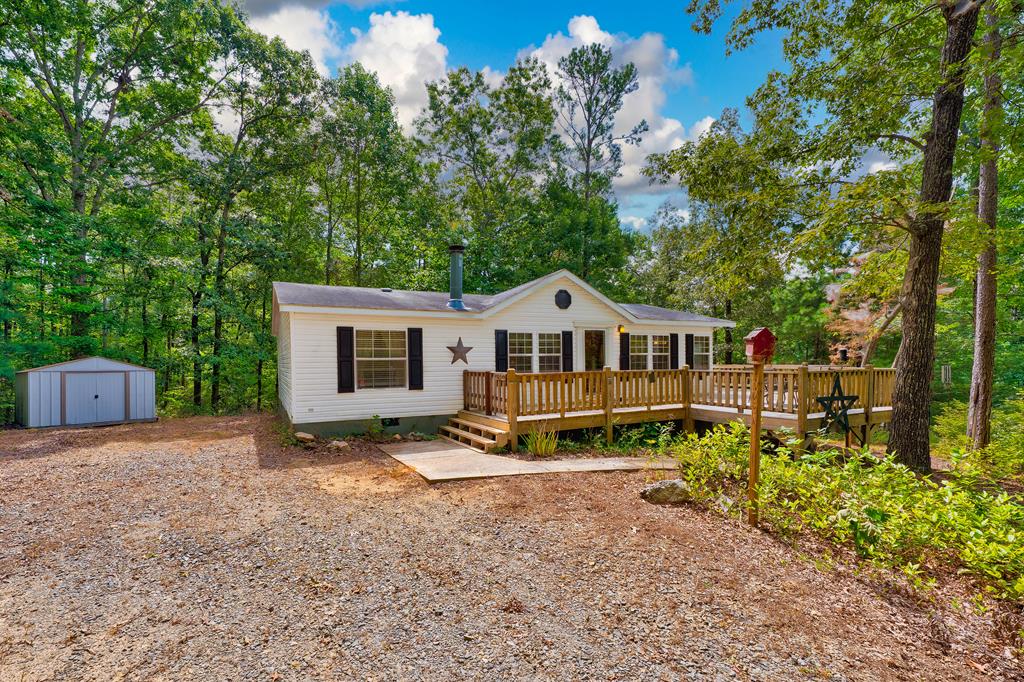 150 Hickory Hls Road Ellijay, GA 30540 - Photo 1 of 24 a view of house with outdoor space and sitting area