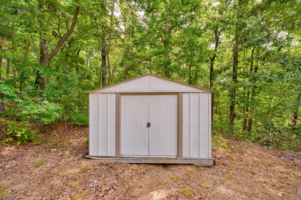 150 Hickory Hls Road Ellijay, GA 30540 - Photo 24 of 24 a house with trees in the background