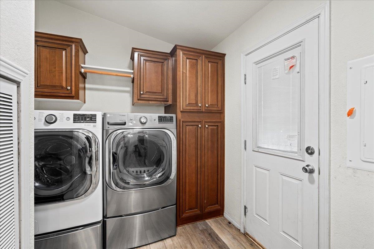 943 Kokomo Road Haiku, HI 96708 - Photo 29 of 50 a utility room with dryer and washer