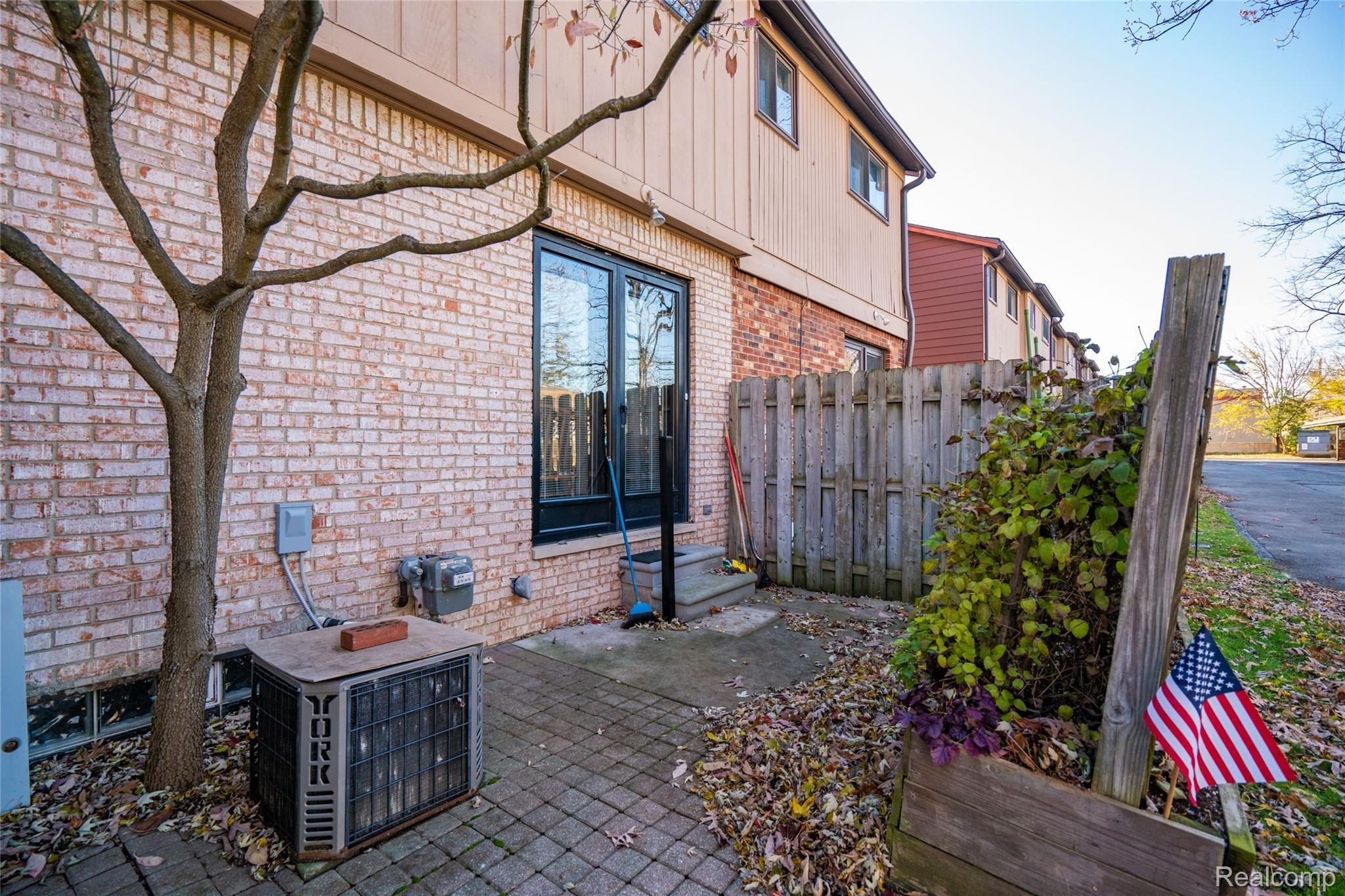 3146 Summers Road, Unit 17 Keego Harbor, MI 48320 - Photo 18 of 22 Rear Private Patio off Kitchen
