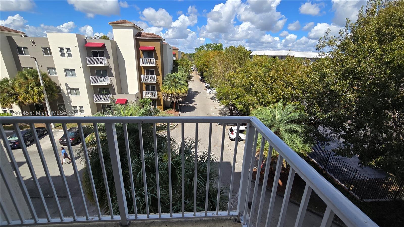 11060 Southwest 196th Street, Unit 407 Cutler Bay, FL 33157 - Photo 11 of 25 a view of building from balcony