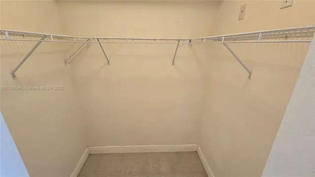 a view of small space with racks on the wall