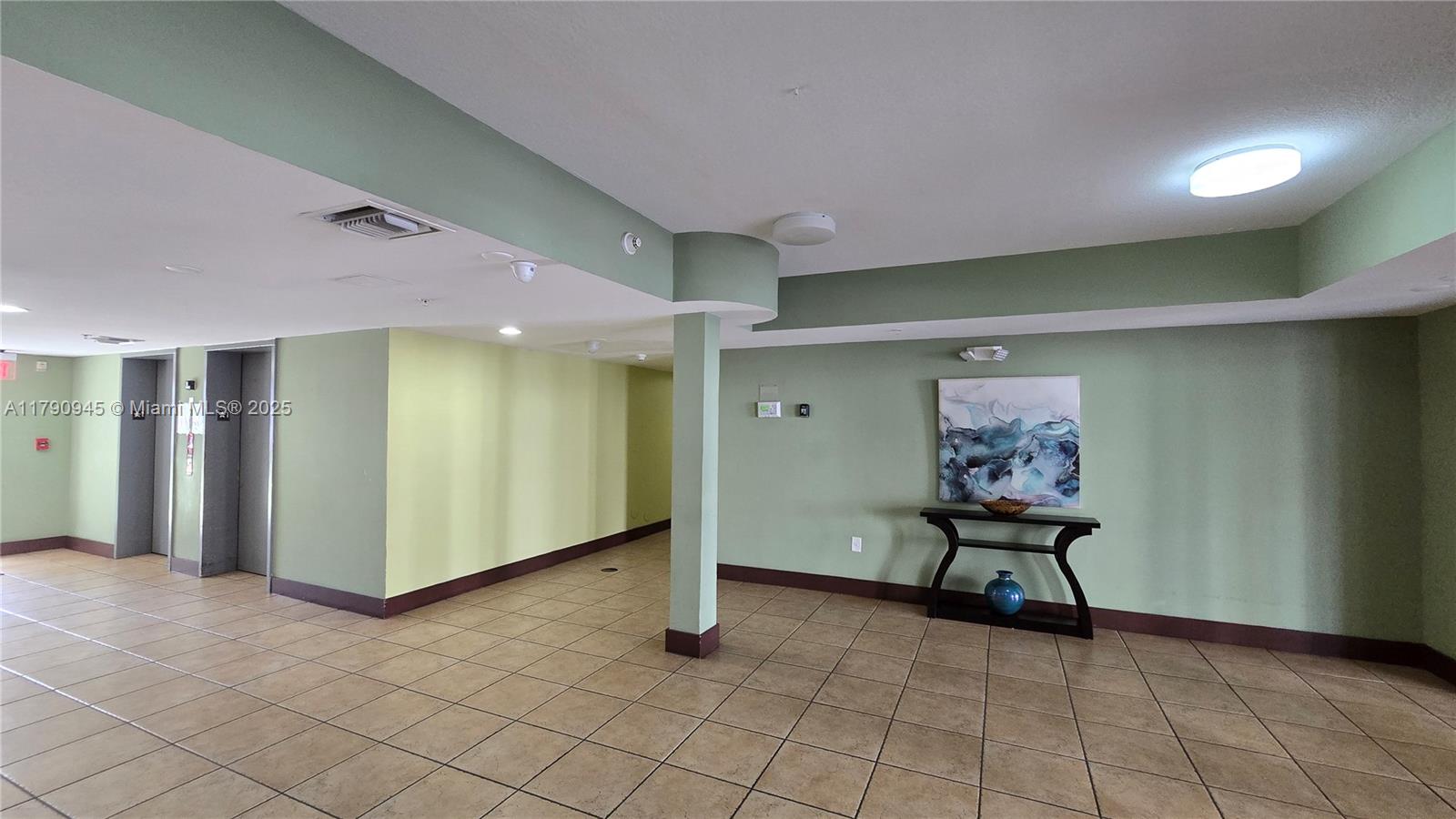 11060 Southwest 196th Street, Unit 407 Cutler Bay, FL 33157 - Photo 18 of 25 a view of an empty room