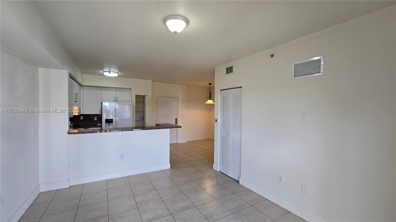 11060 Southwest 196th Street, Unit 407 Cutler Bay, FL 33157 - Photo 2 of 25 a view of a kitchen with a sink