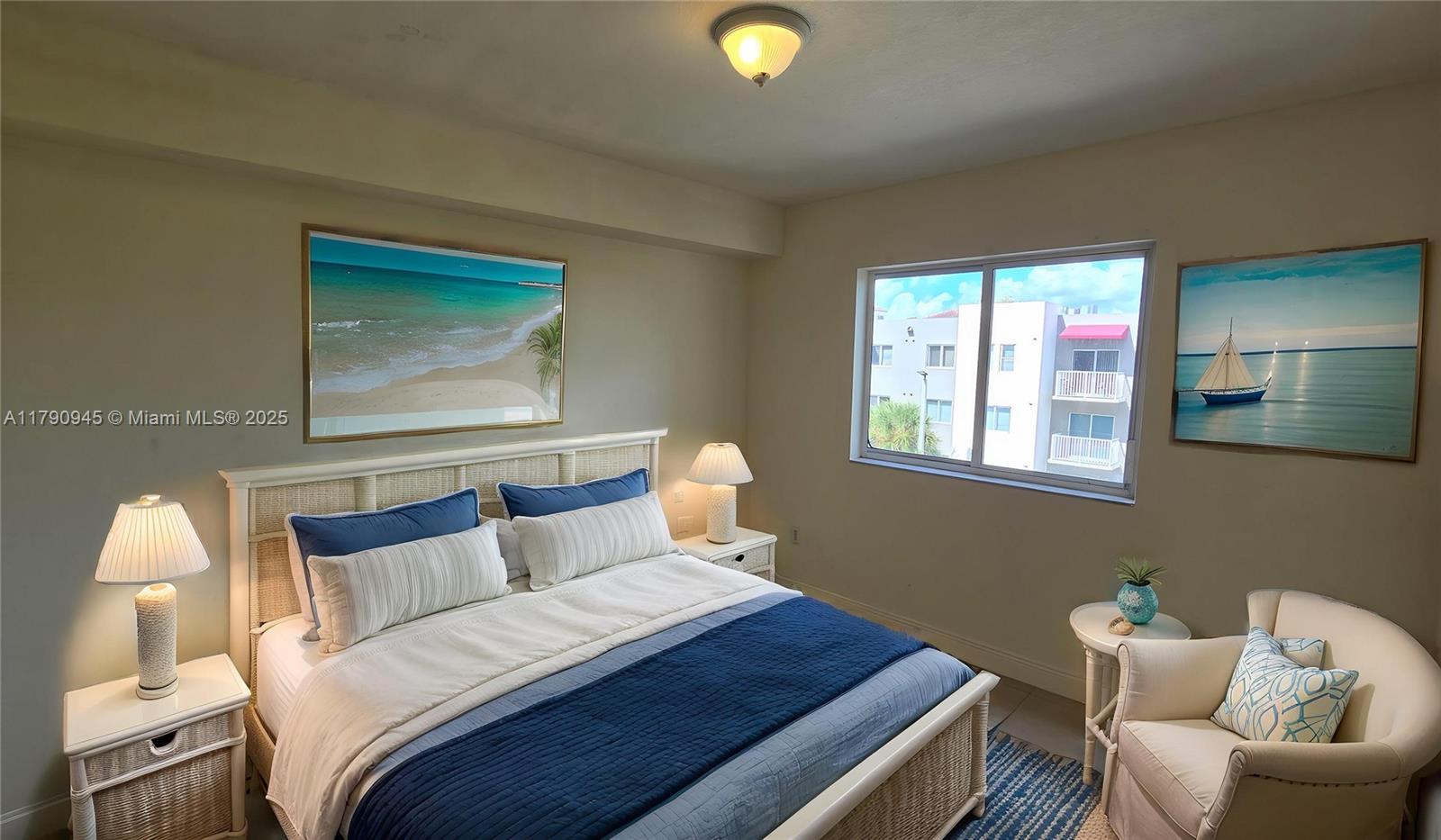 11060 Southwest 196th Street, Unit 407 Cutler Bay, FL 33157 - Photo 3 of 25 a bedroom with a bed and window