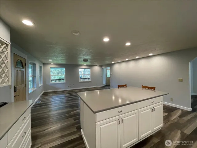 a kitchen with sink and window