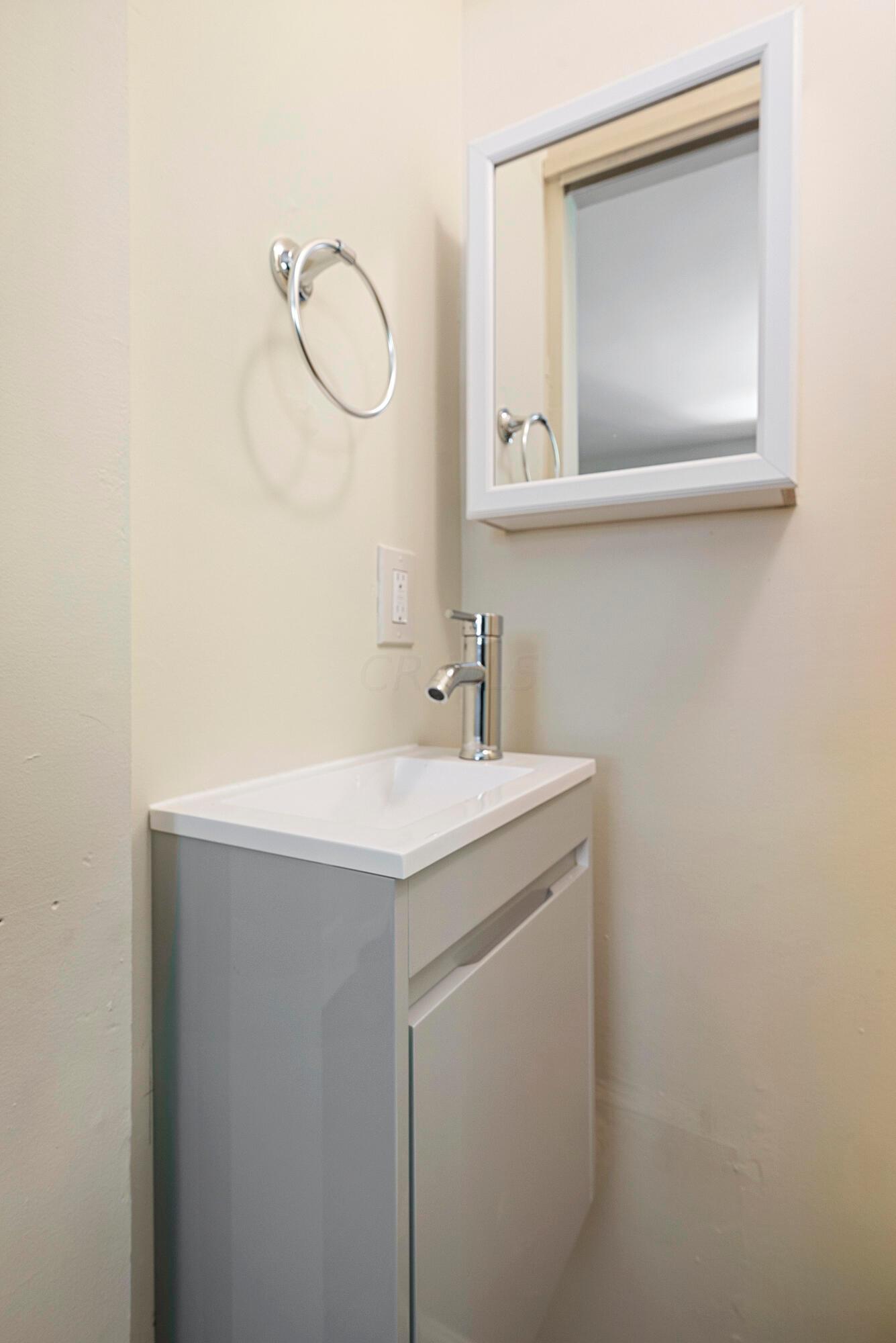 217 Gladys Road Columbus, OH 43228 - Photo 15 of 34 Primary Half Bathroom