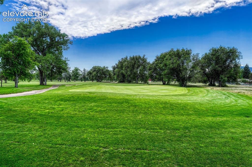 2103 Paseo Road Colorado Springs, CO 80907 - Photo 7 of 38 The back yard backs to the 4th hole of the Patty Jewett Golf course.