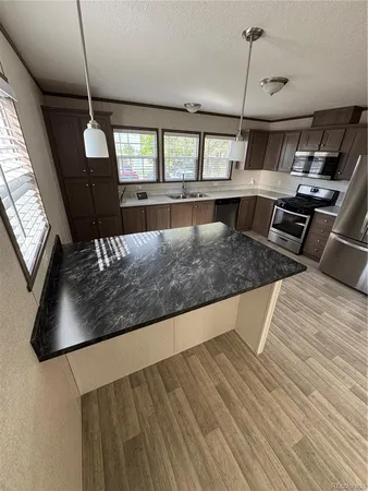 a view of kitchen and living room