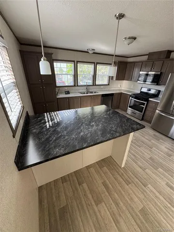 a view of kitchen and living room