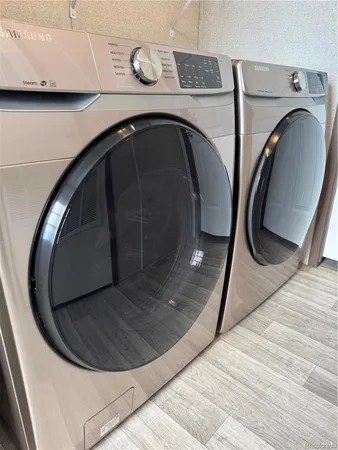 a view of a utility room with washer and dryer