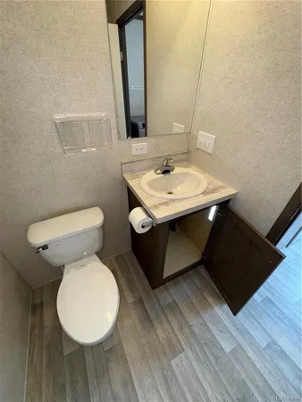 a bathroom with a sink and a toilet