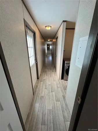 a view of entryway with wooden floor