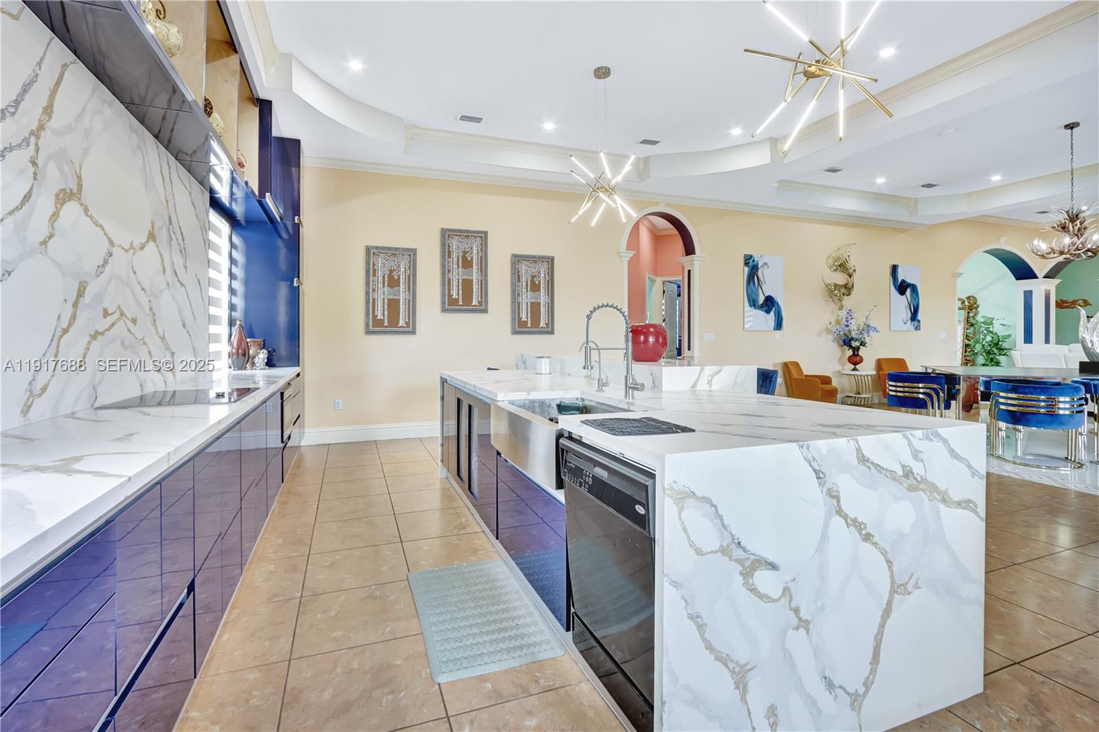 20455 Southwest 154th Avenue Miami, FL 33187 - Photo 12 of 95 a large kitchen with stainless steel appliances kitchen island granite countertop a sink and dishwasher a stove with wooden floor