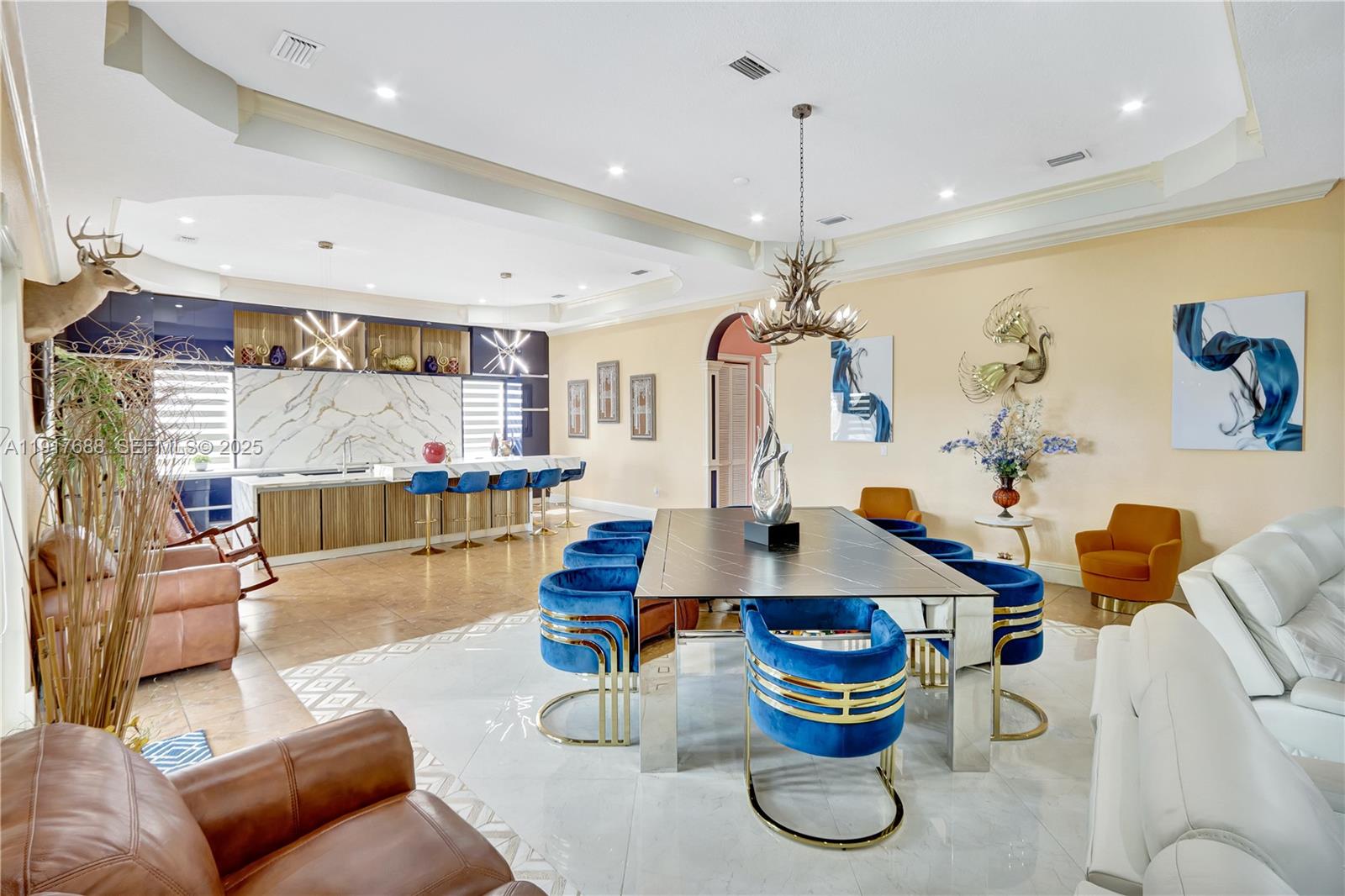 20455 Southwest 154th Avenue Miami, FL 33187 - Photo 13 of 95 a living room with kitchen island furniture and a chandelier