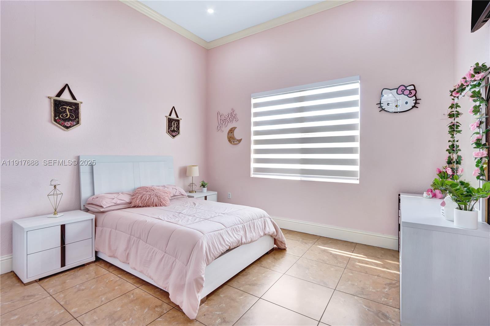 20455 Southwest 154th Avenue Miami, FL 33187 - Photo 26 of 95 a bedroom with a bed and a window