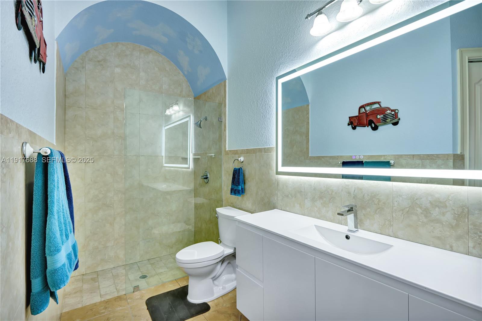 20455 Southwest 154th Avenue Miami, FL 33187 - Photo 32 of 95 a bathroom with a sink mirror and toilet