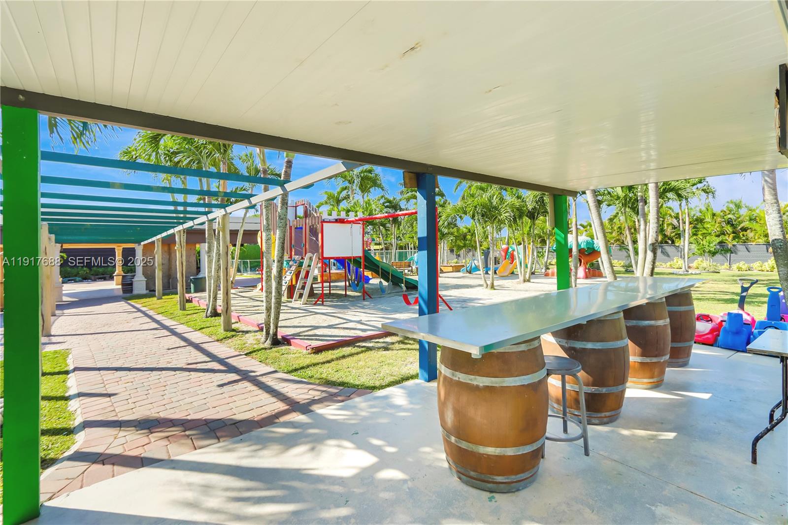 20455 Southwest 154th Avenue Miami, FL 33187 - Photo 79 of 95 a view of swimming pool with seating space