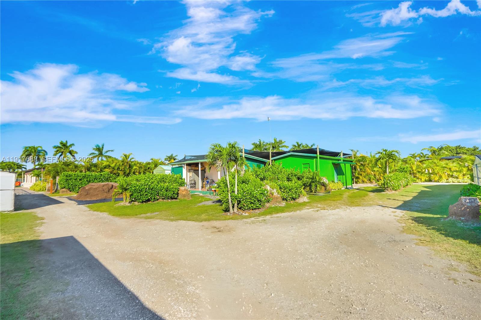 20455 Southwest 154th Avenue Miami, FL 33187 - Photo 91 of 95 a view of a garden with plants