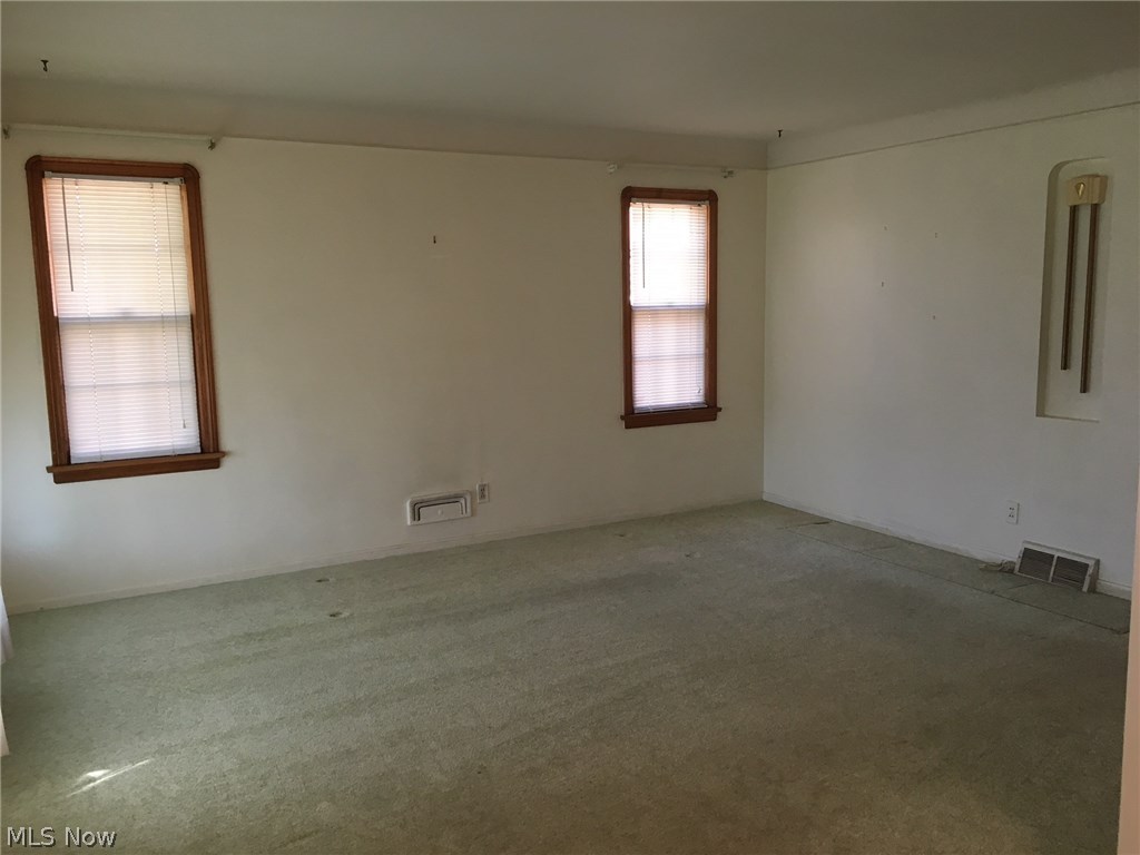 6409 Manchester Road Parma, OH 44129 - Photo 6 of 24 Large living room. Hardwood under carpeting