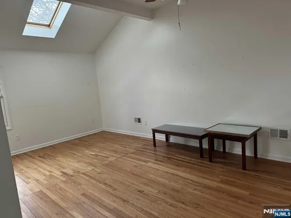 a view of livingroom with furniture and wooden floor