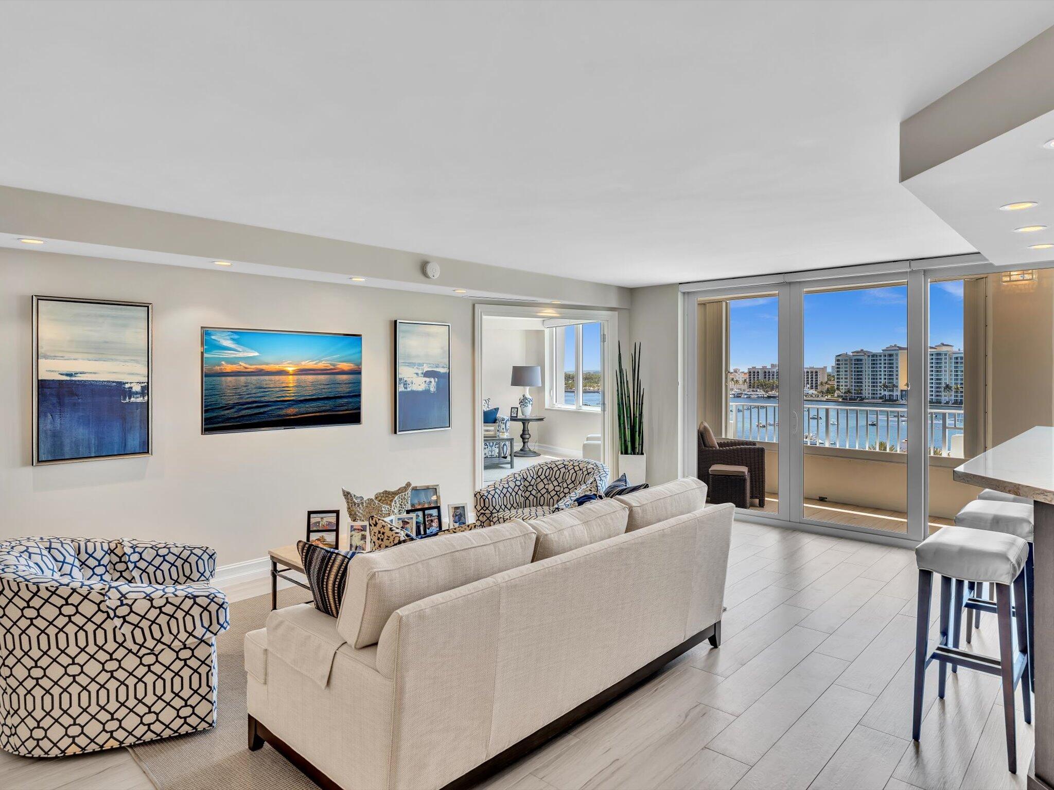 500 South Ocean Boulevard, Unit 909 Boca Raton, FL 33432 - Photo 7 of 101 a living room with furniture and a view of kitchen