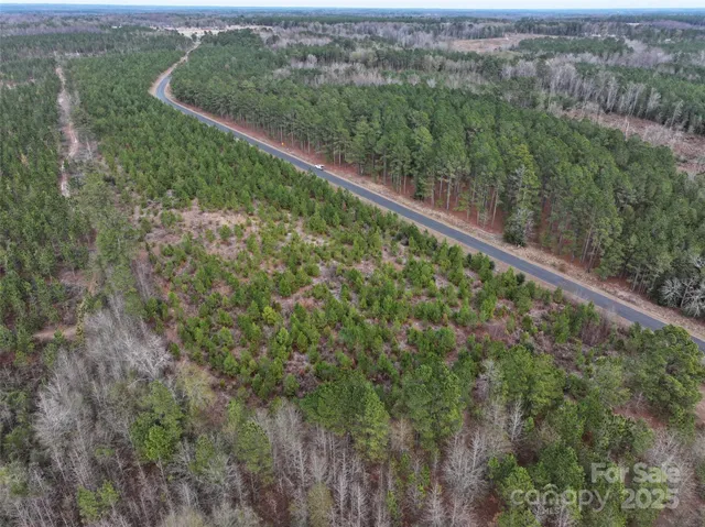 a view of a green space with sea