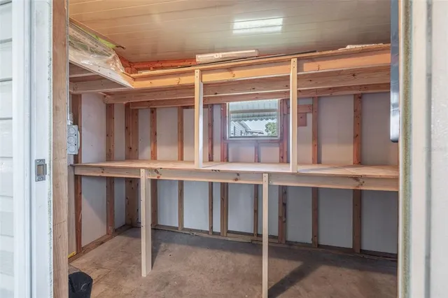 a view of an house with backyard and patio