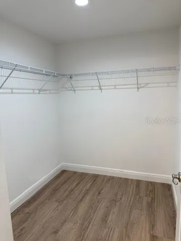 a view of a room with racks on the wall