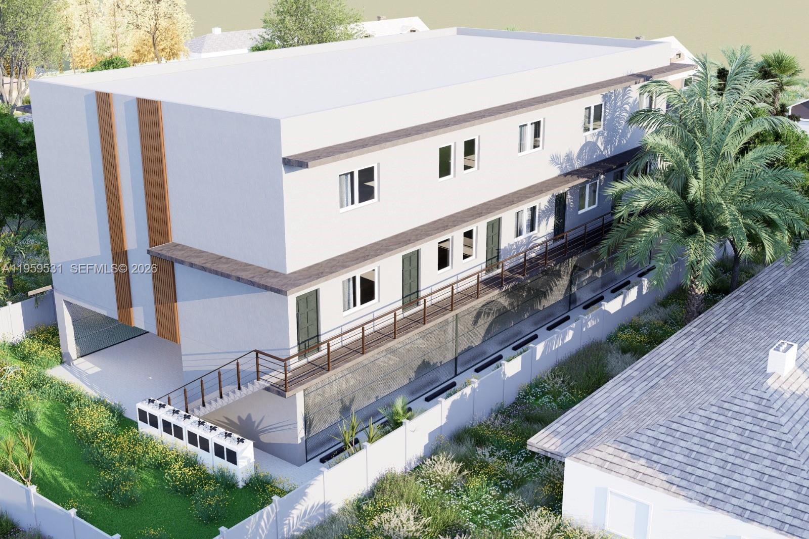 1949 Harding Street Hollywood, FL 33020 - Photo 3 of 3 a large white building with a white roof