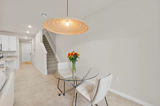 a view of a dining room with furniture