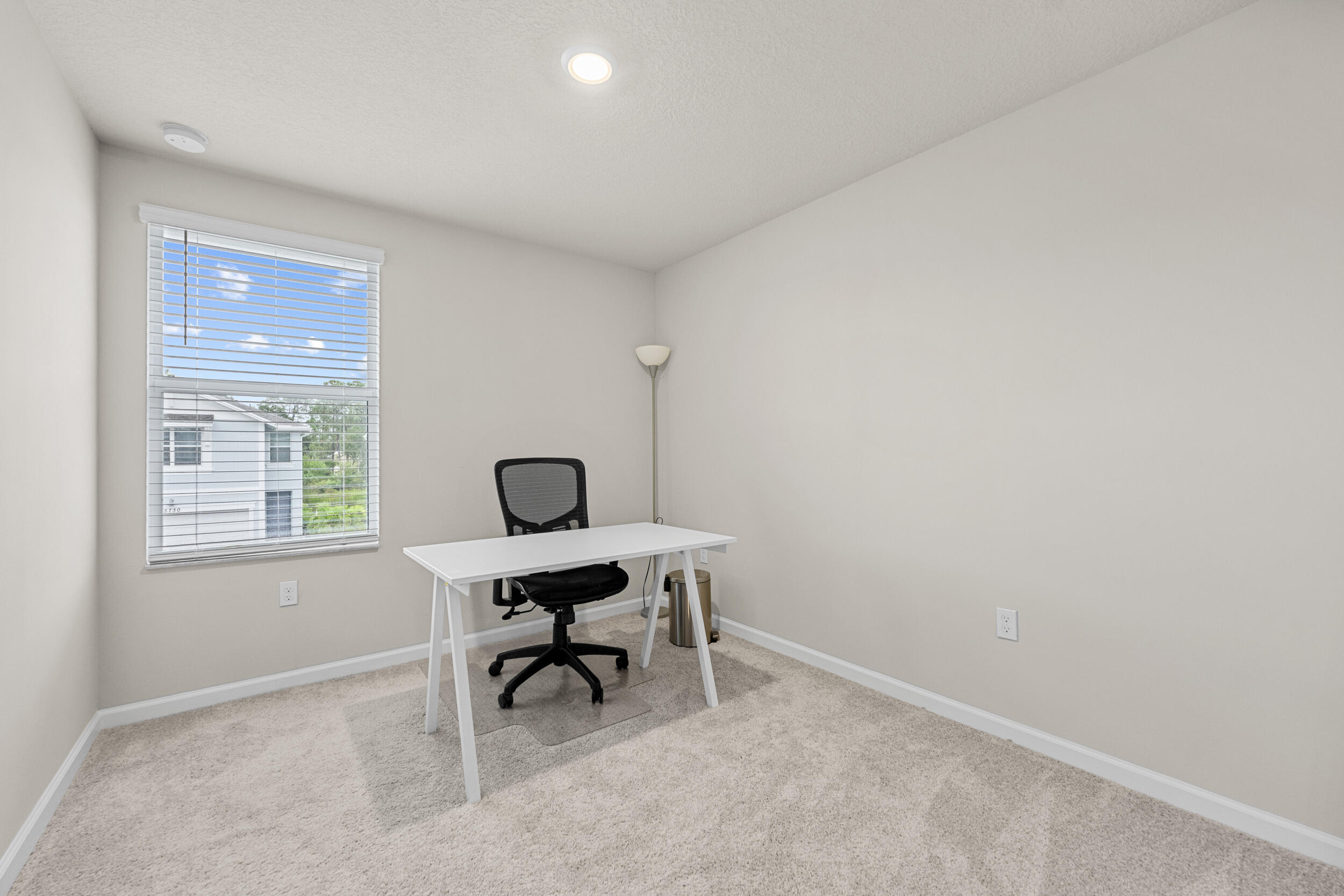 5731 Southeast Edgewater Circle Stuart, FL 34997 - Photo 23 of 42 a workspace with a window