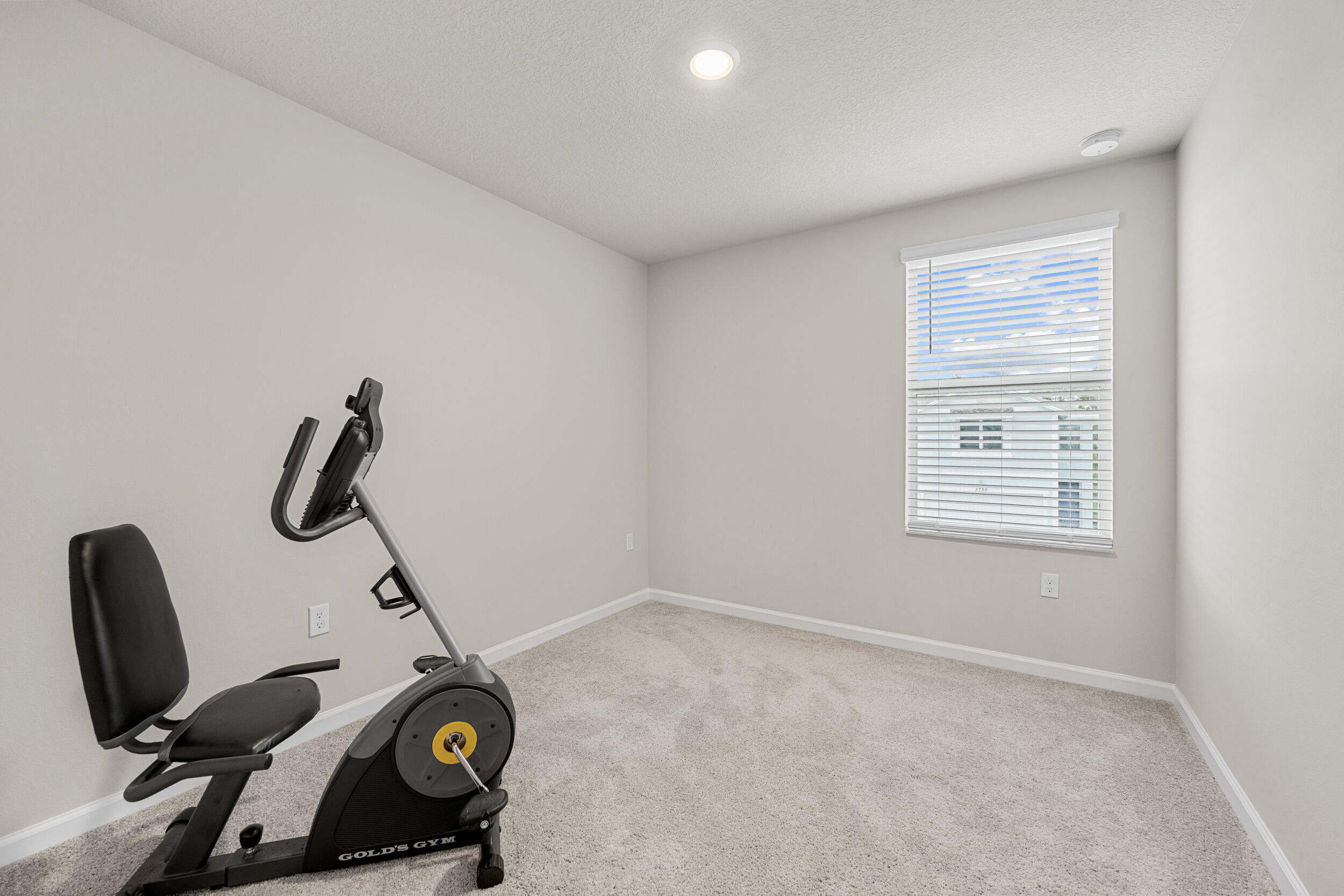 5731 Southeast Edgewater Circle Stuart, FL 34997 - Photo 26 of 42 a view of room with gym equipment